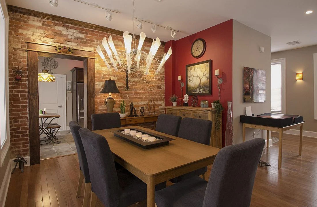 Restored brick archway and interior in a Habitat Building historic home renovation